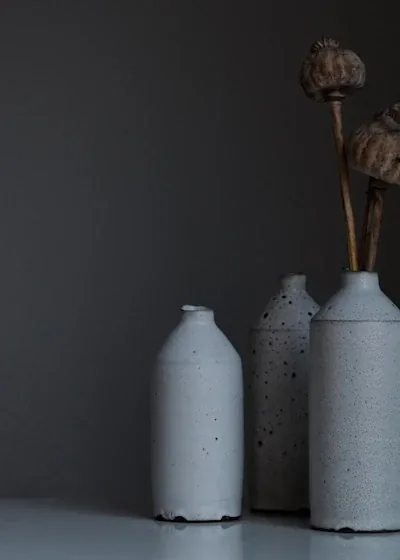 Vibrant digital illustration printed on canvas showing an urban Edmonton streetscape reimagined as a lush garden overgrown with wildflowers