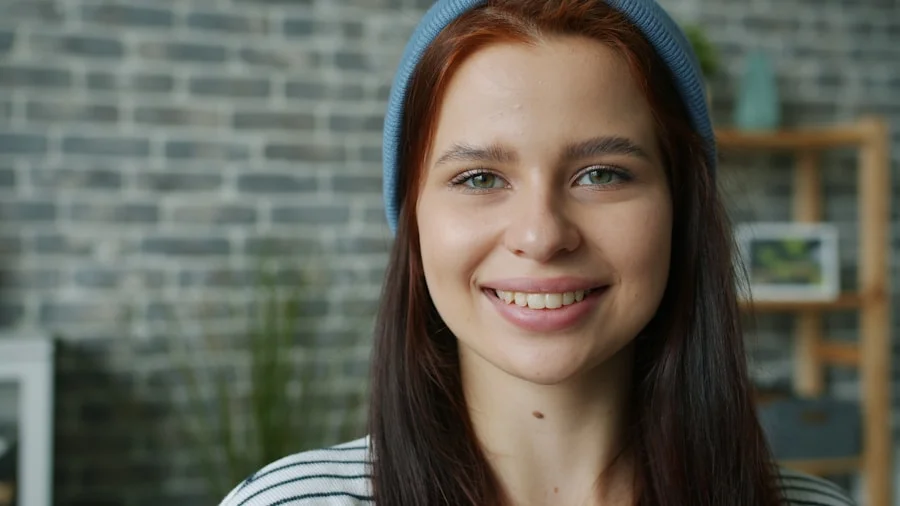 Two people walking and talking together on a tree-lined path